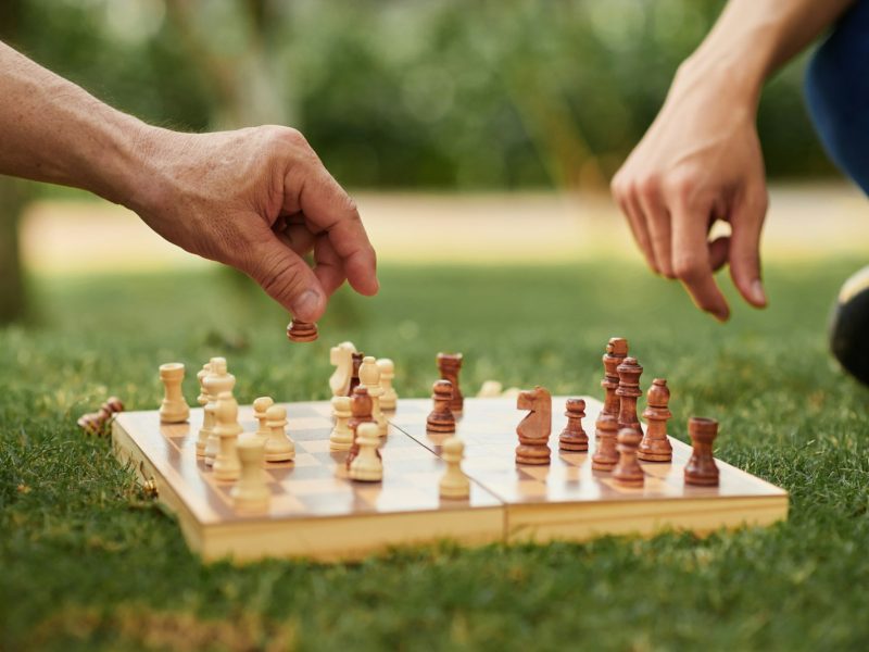 Father and Son Playing Chess